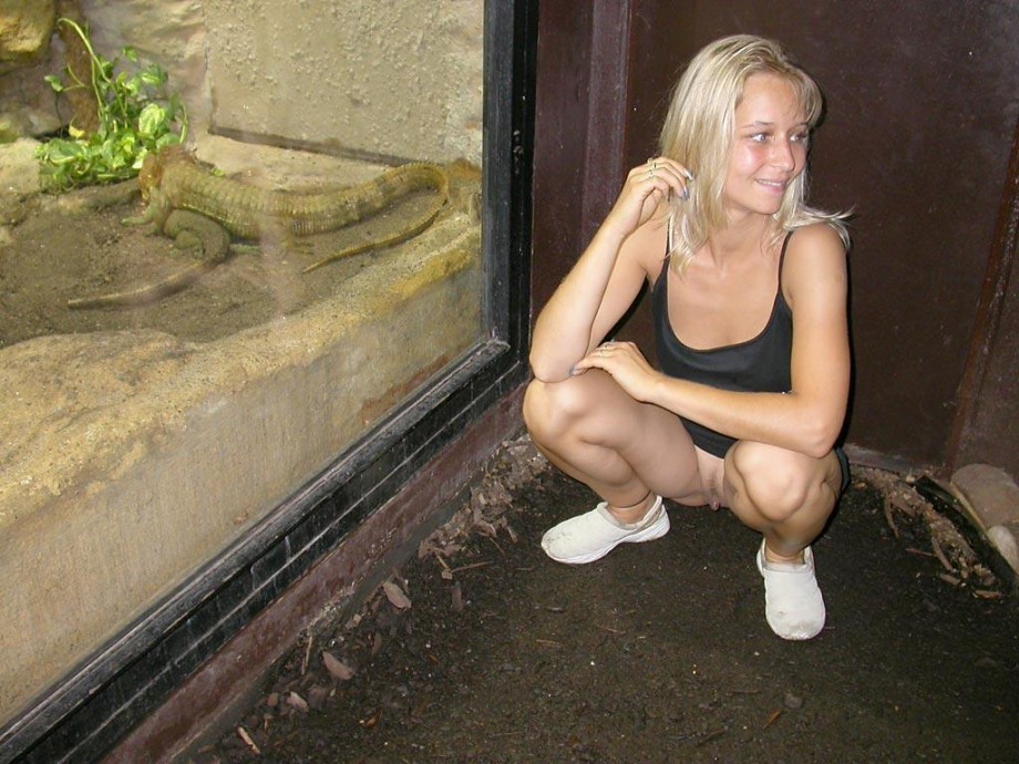 Young blonde girl and her exhibition  from the zoo