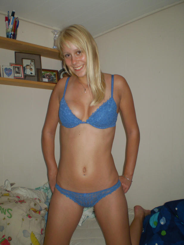 Young blond girl and her stripping for boyfriend