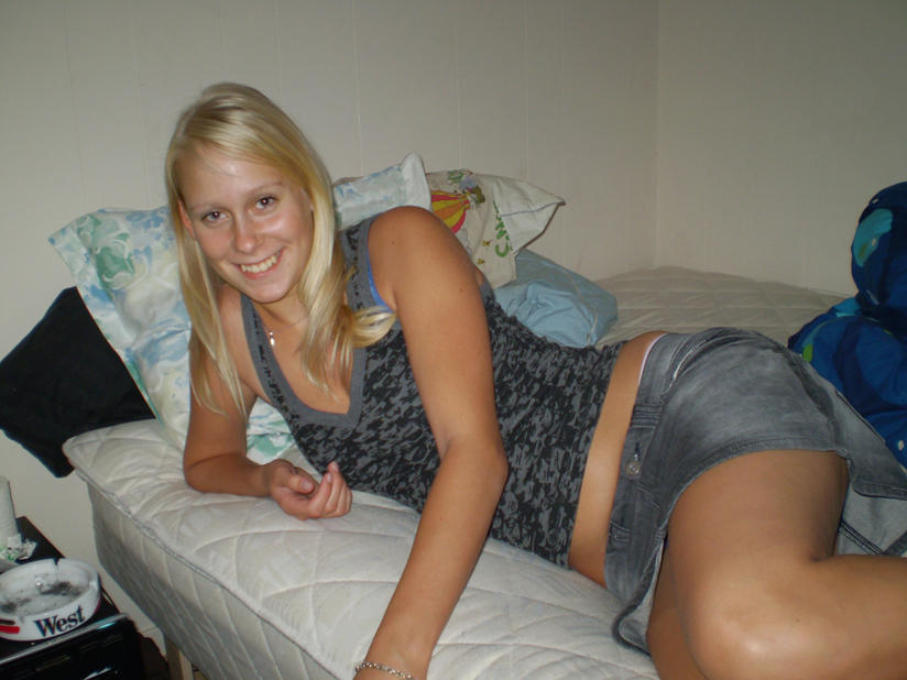 Young blond girl and her stripping for boyfriend
