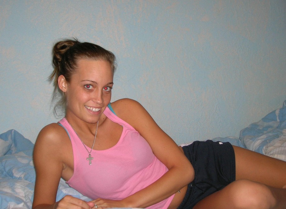 Girl posing in bedroom 