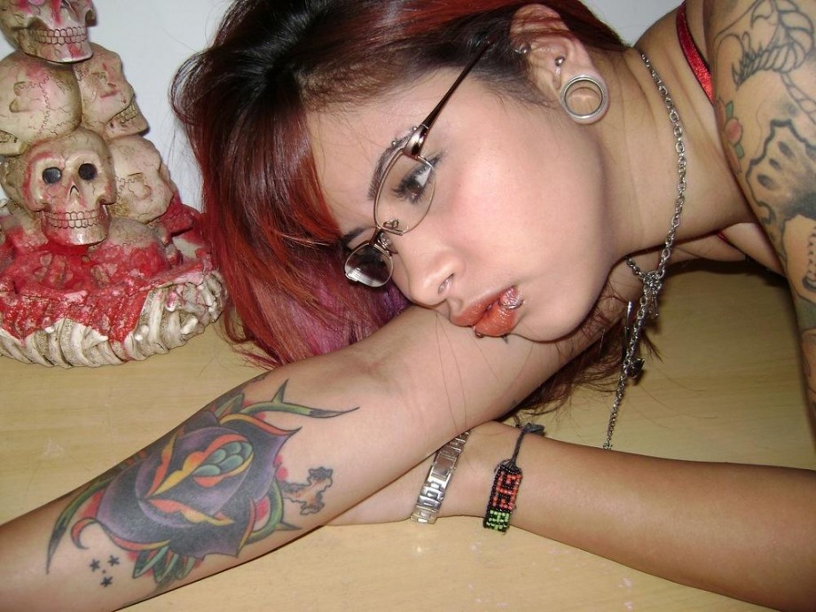 Redhead and  tattoo emo girl 