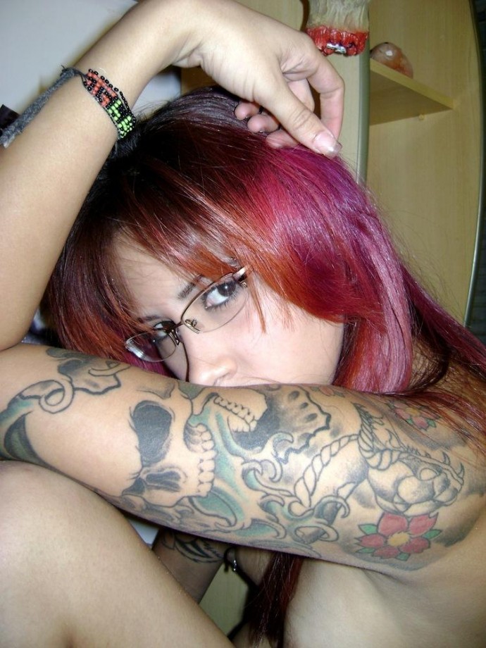 Redhead and  tattoo emo girl 