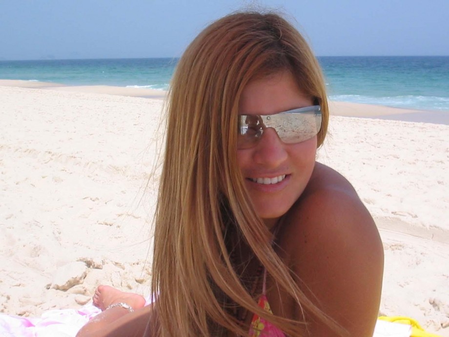 Blonde cutie with hot tanlines at beach