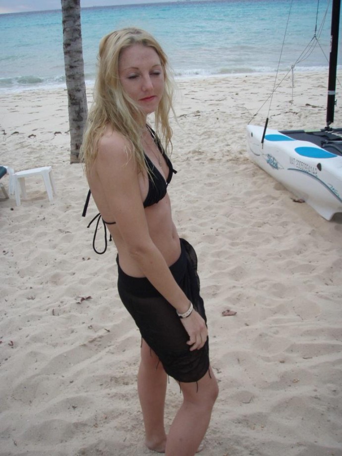 Girlfriend in micro bikini at beach
