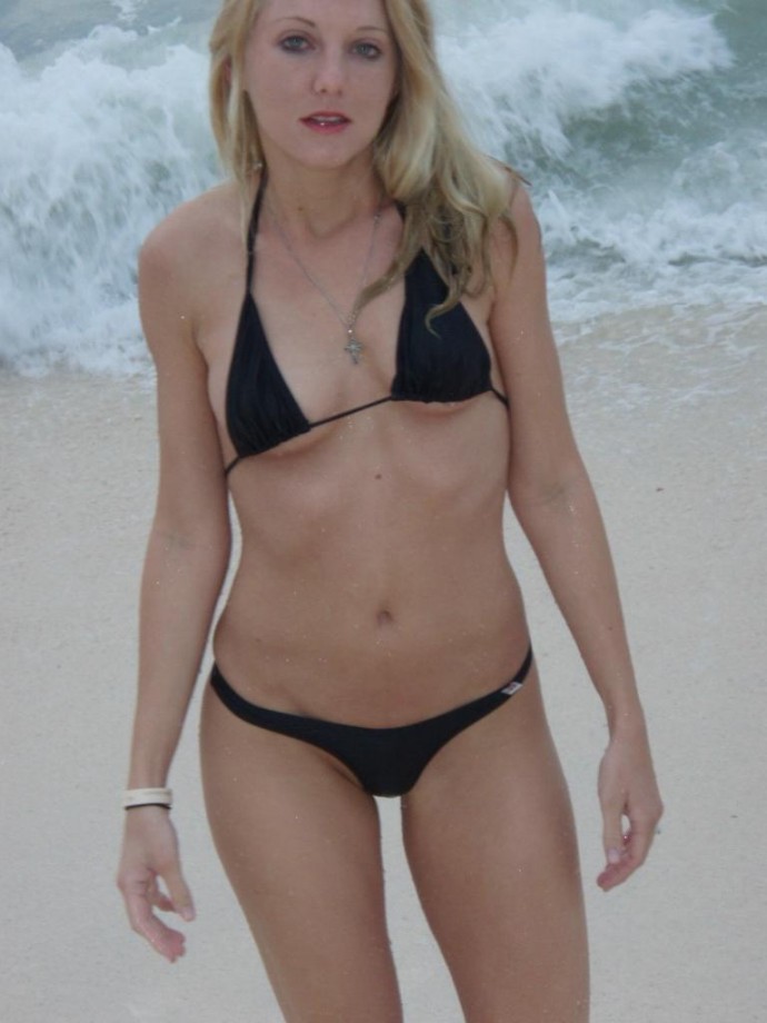Girlfriend in micro bikini at beach
