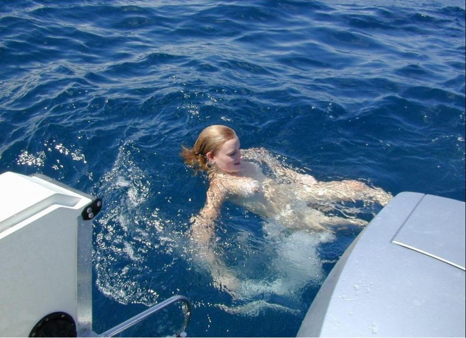 Two shaved girls on a boat 