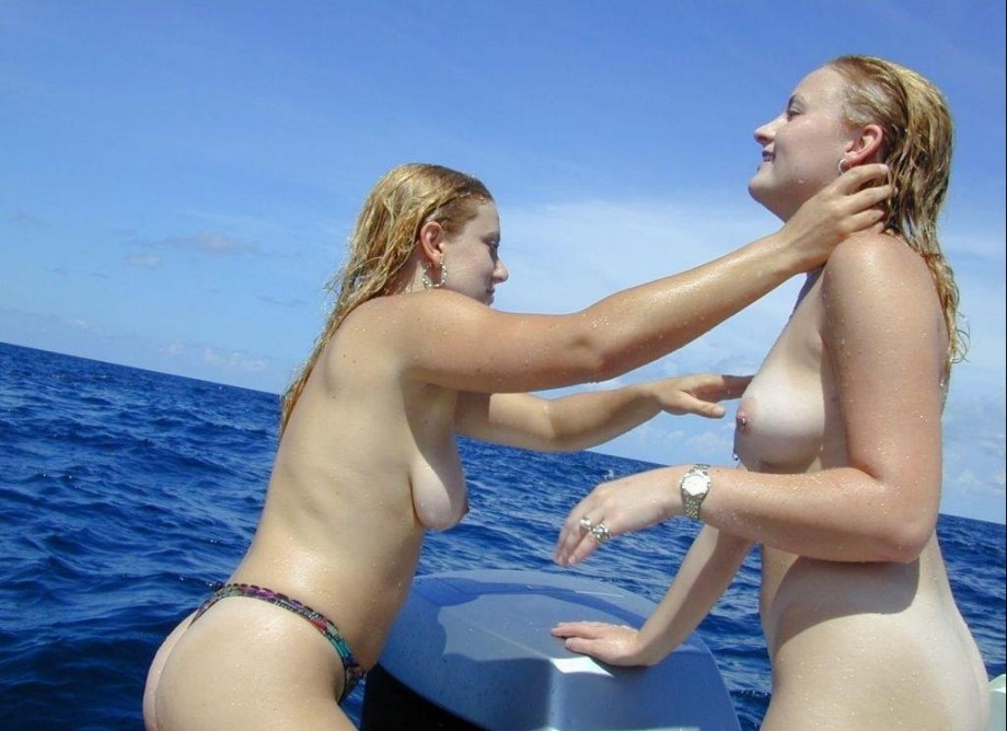 Two shaved girls on a boat 