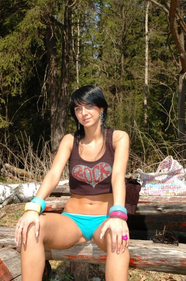 Cute russian brunette teen stripping in the forest