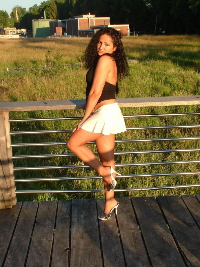 Latina posing outdoors