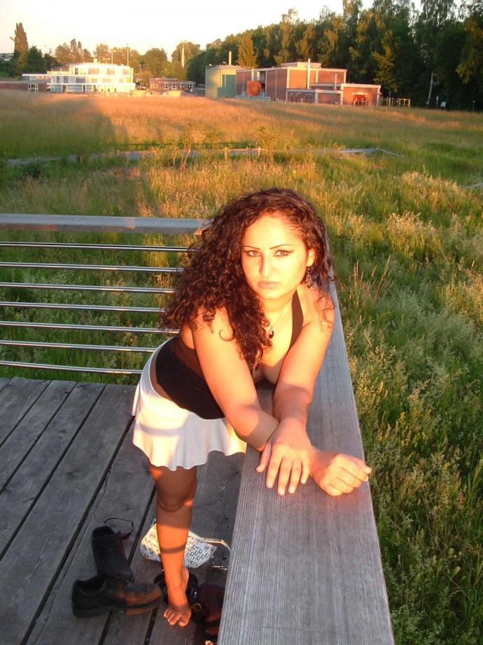 Latina posing outdoors