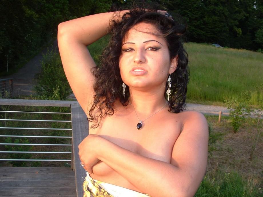 Latina posing outdoors