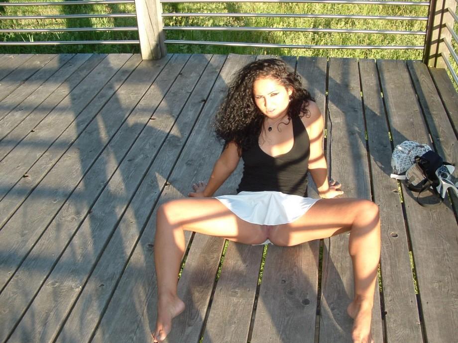 Latina posing outdoors