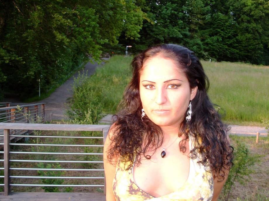 Latina posing outdoors