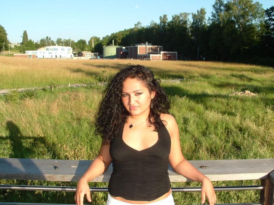 Latina posing outdoors