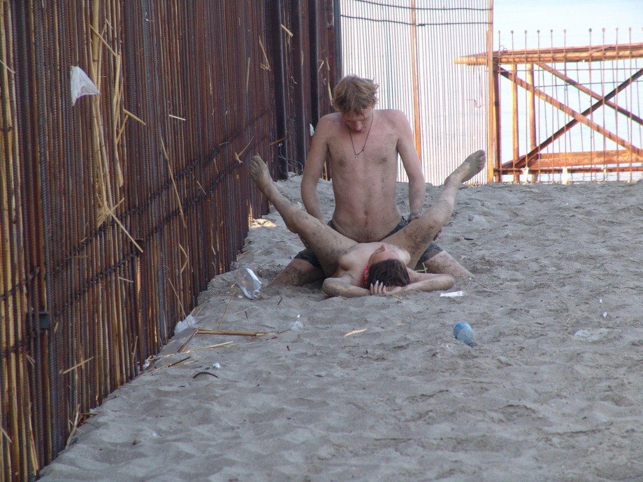 Couple fucking at nude beach