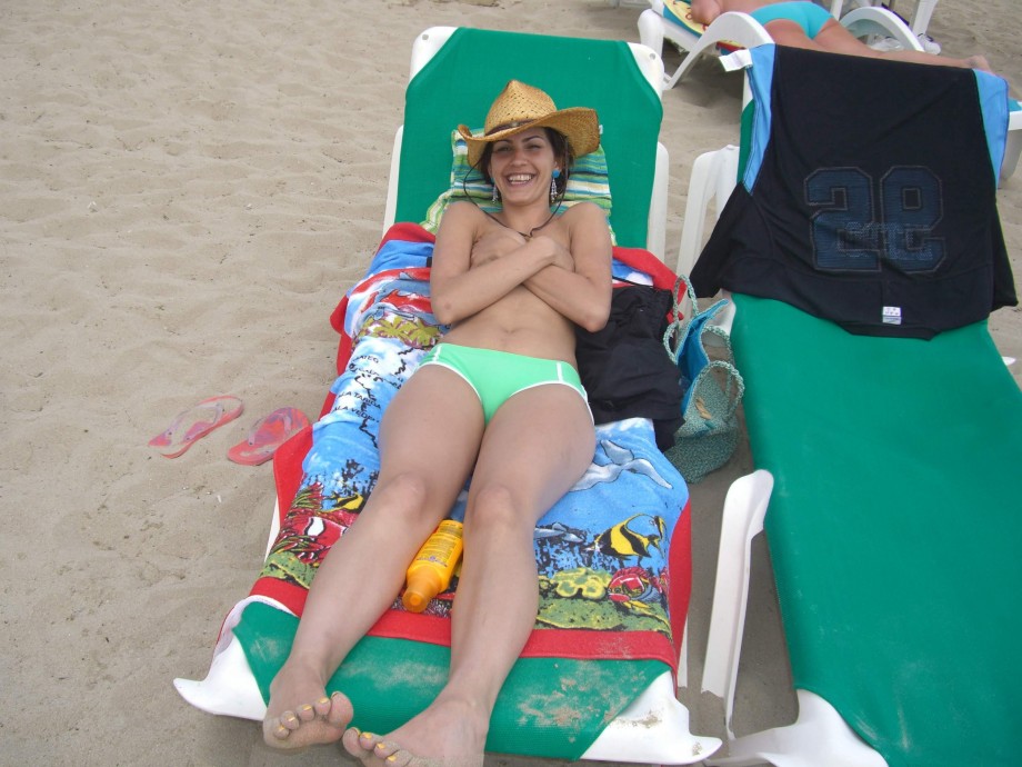 Topless teen girl at ibiza beach