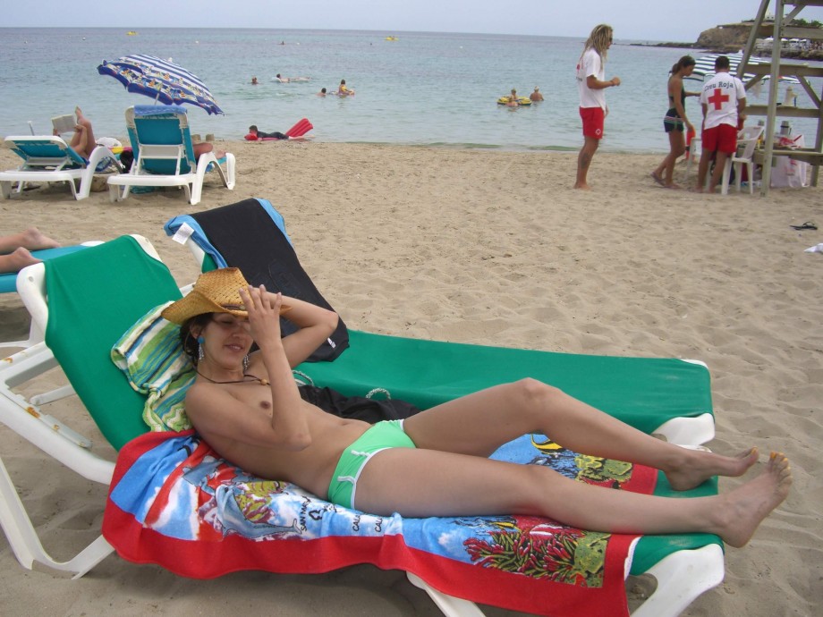 Topless teen girl at ibiza beach