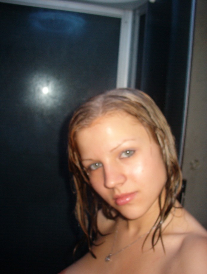 Hot blonde masturbates in the shower