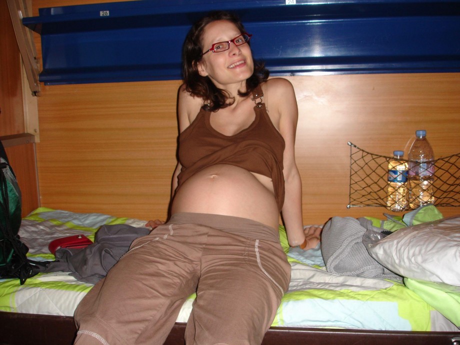 Pregnant milf with glassesposing 