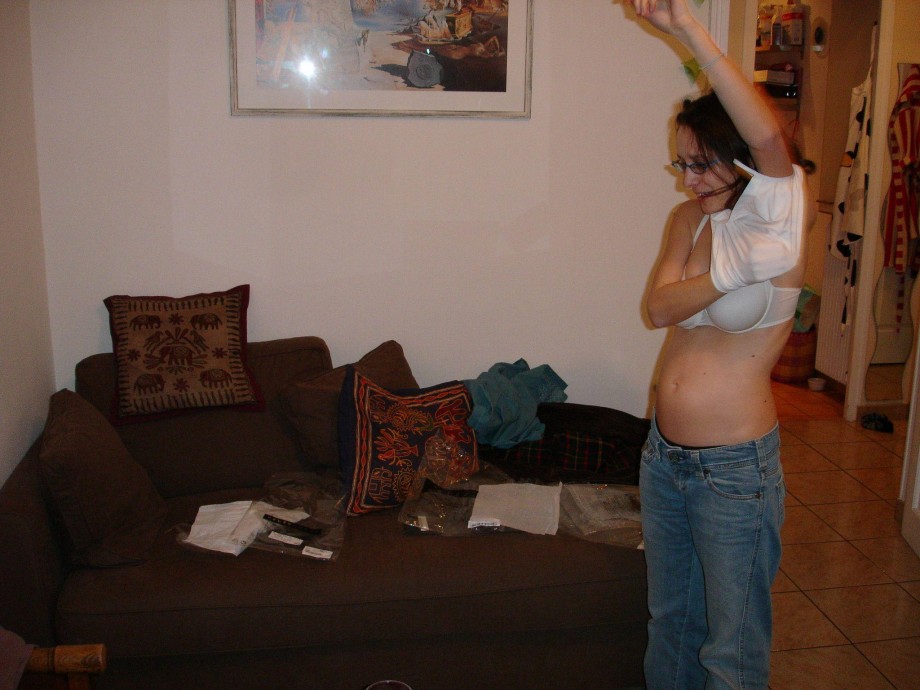 Pregnant milf with glassesposing 