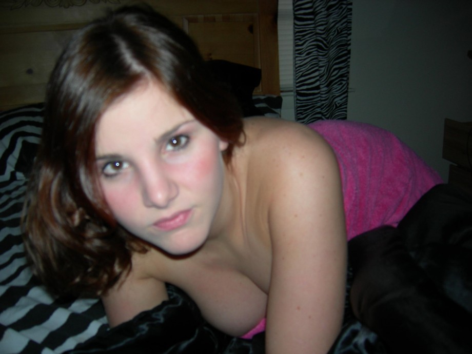 Brunette girl naked on the bed