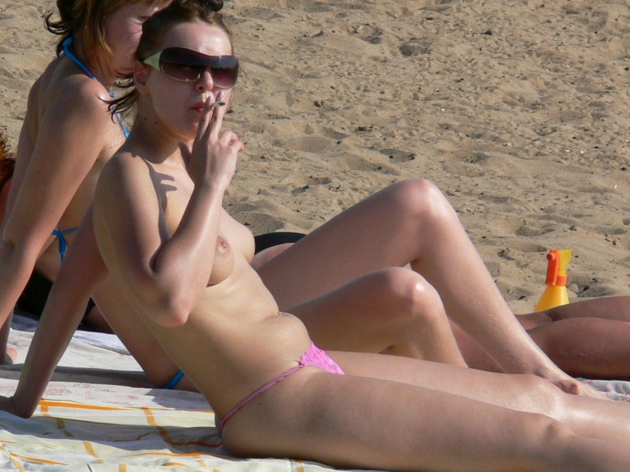 Spying on topless russian beach hottie (un)aware  