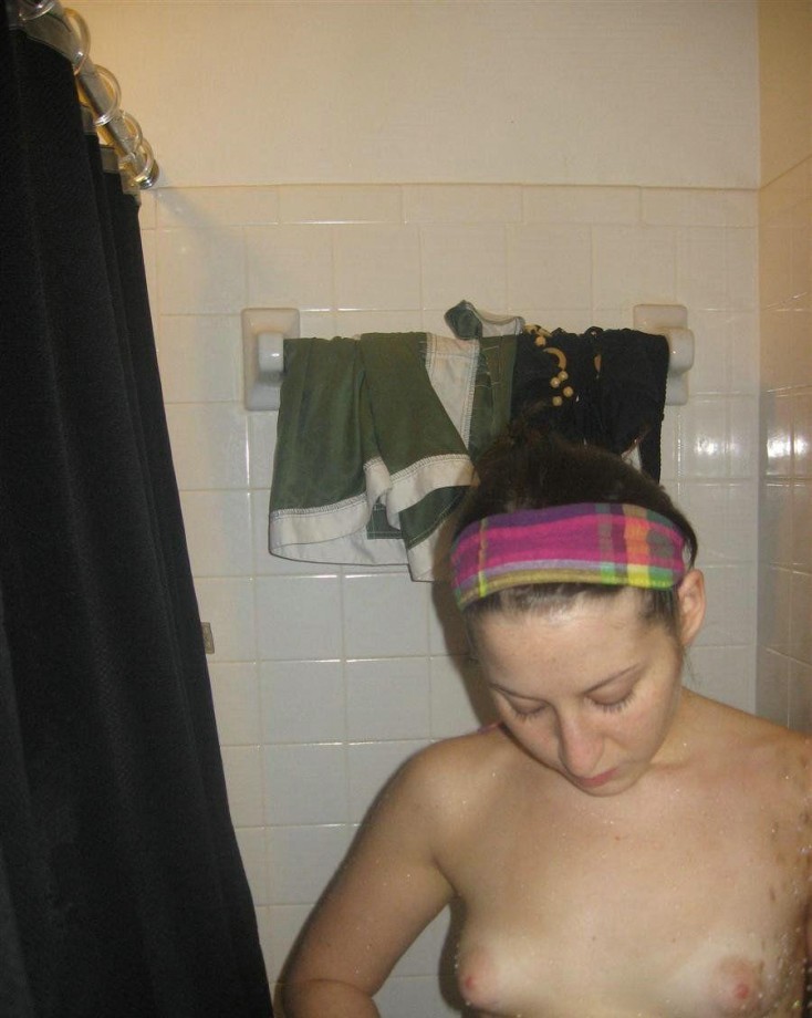 Sexy girl  shaving in the shower 