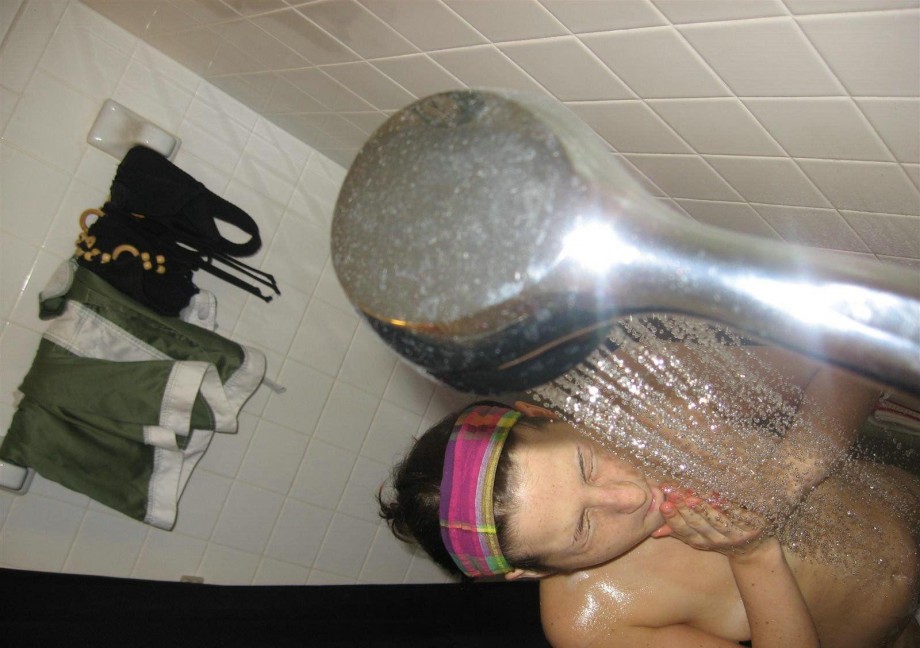 Sexy girl  shaving in the shower 