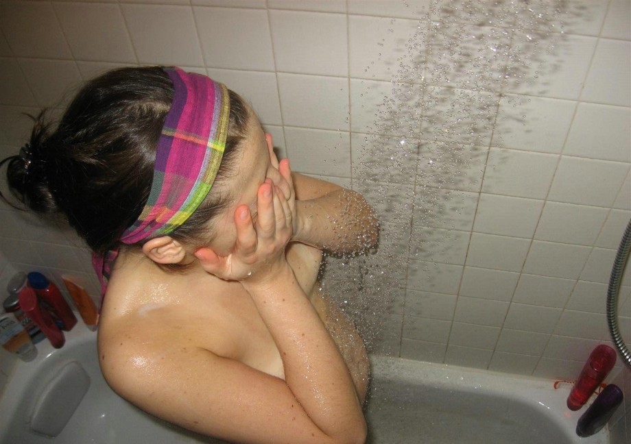 Sexy girl  shaving in the shower 