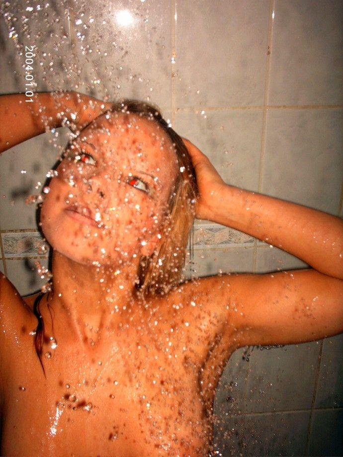Blond girl in shower