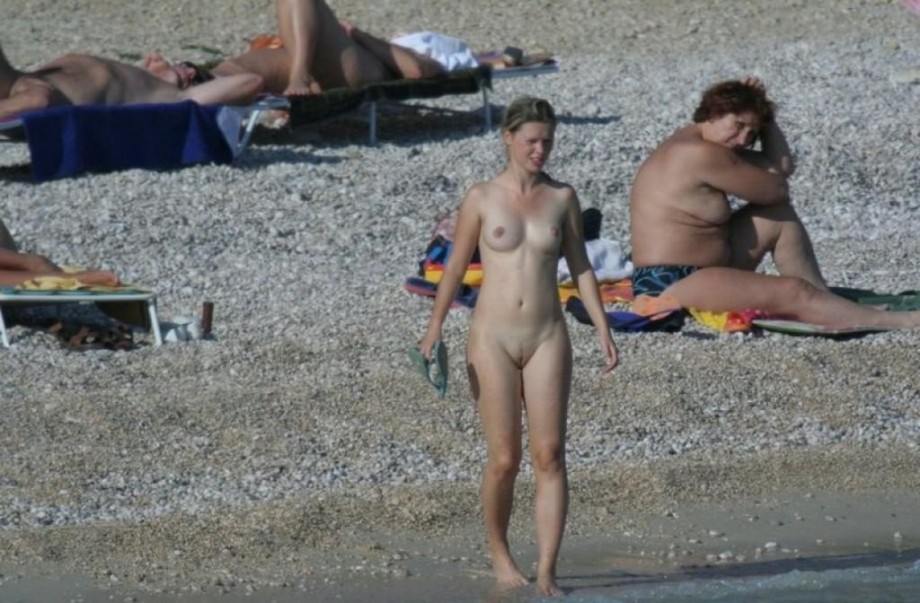 Small boobies at nudist beach 