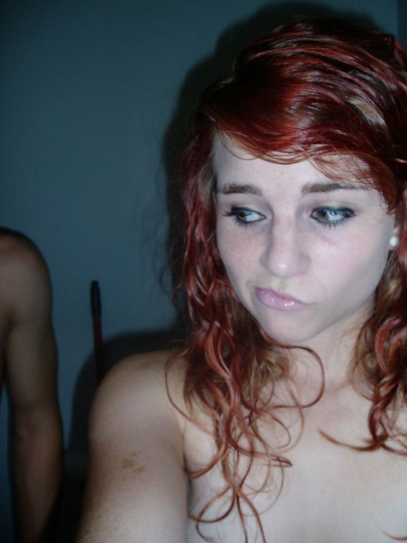 Redhead with shaved pussy