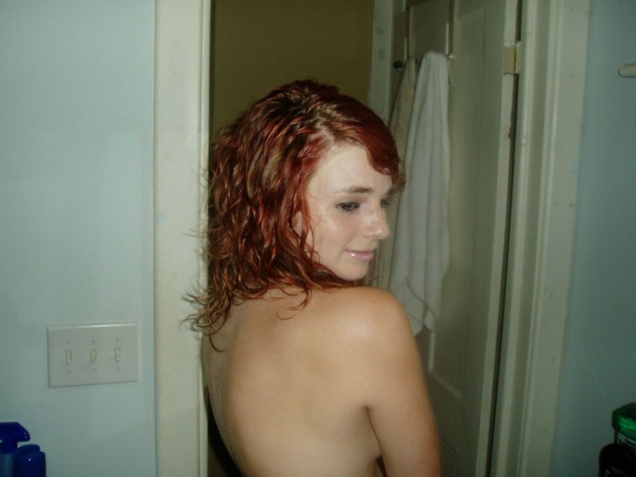 Redhead with shaved pussy