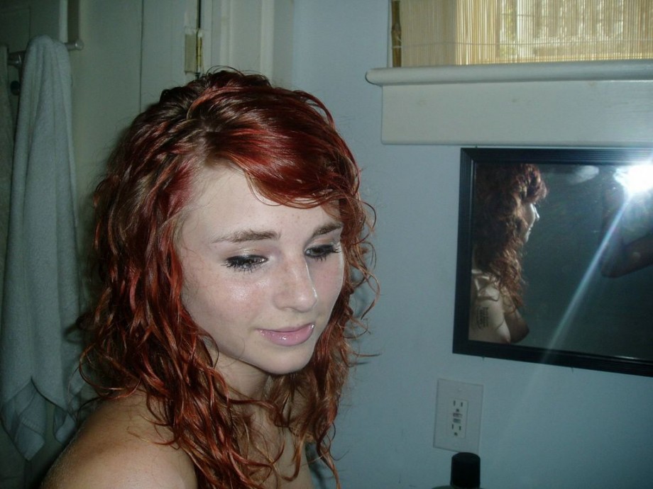 Redhead with shaved pussy