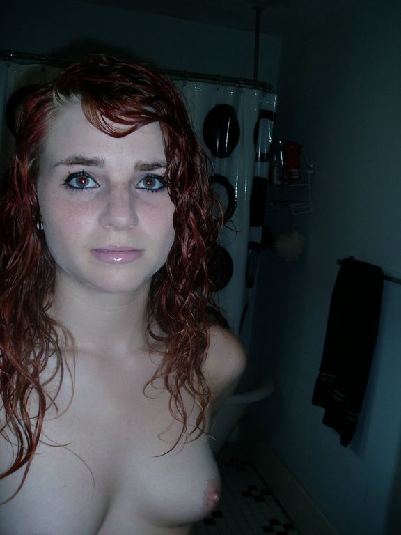 Redhead with shaved pussy