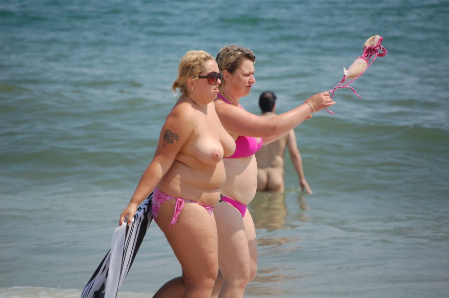 Three teen girls blend in on a nudist beach