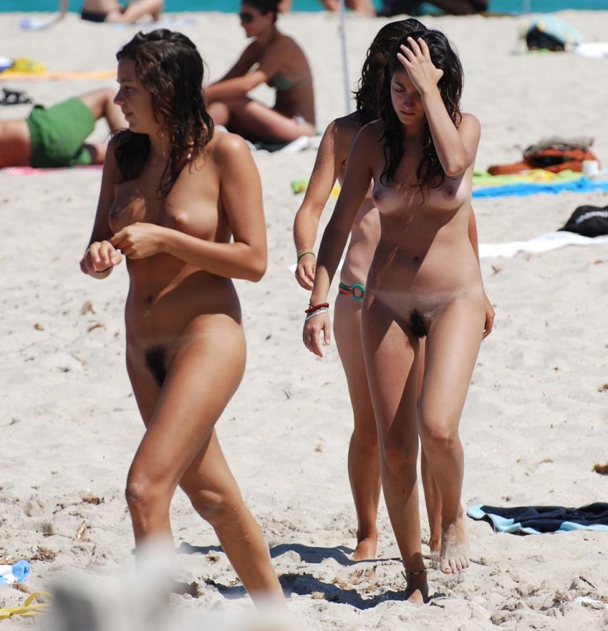 Three hot teens on the nudist beach 1