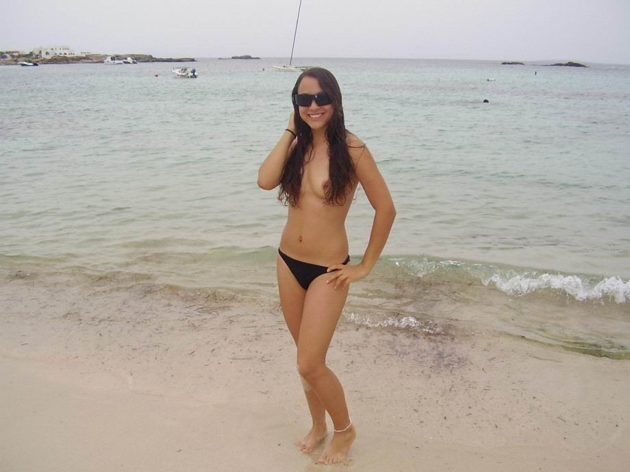 Topless girl at ibiza beach