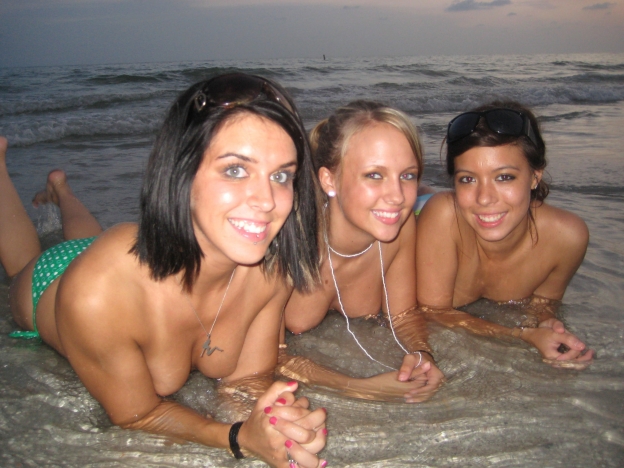 Girls stripping at the beach