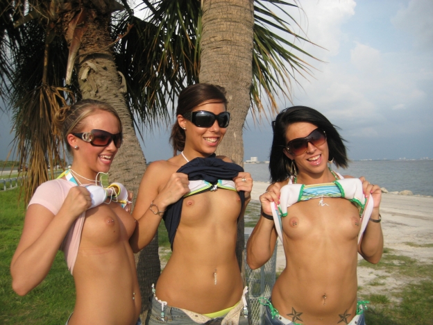 Girls stripping at the beach