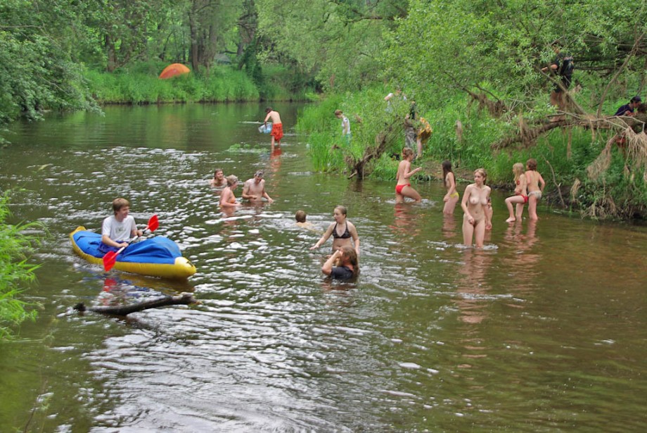 Young russians jump in for a swim naked