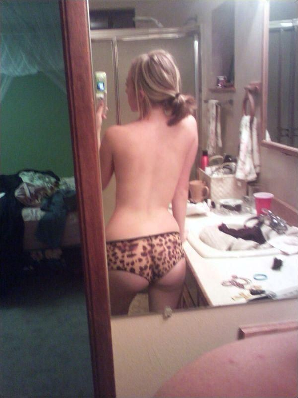 Selfshots - blonde girl in front of mirror