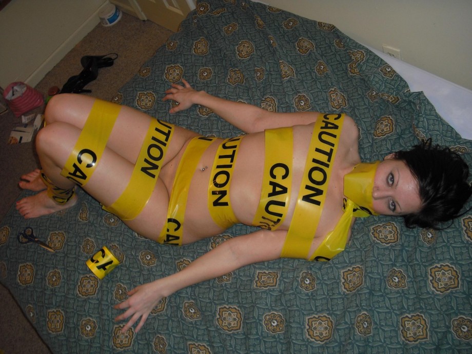 Tight blonde with caution tape