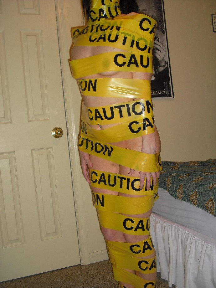 Tight blonde with caution tape