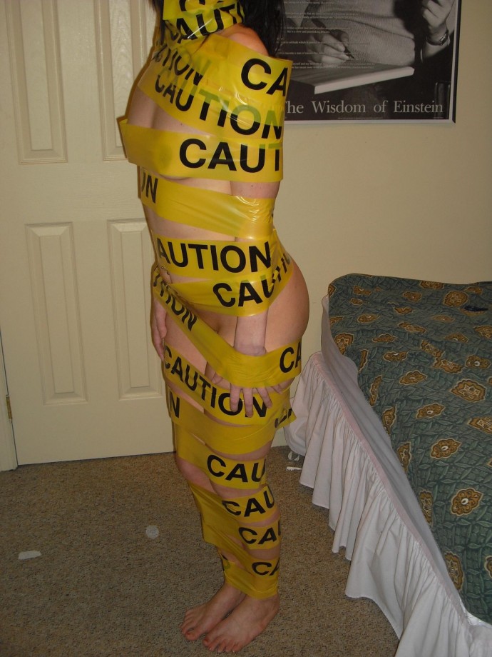 Tight blonde with caution tape