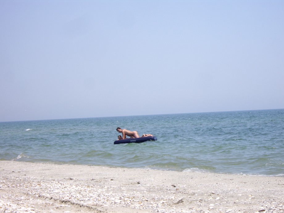 Licking lesbians on beach