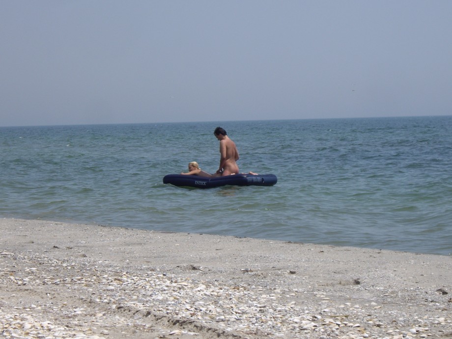 Licking lesbians on beach