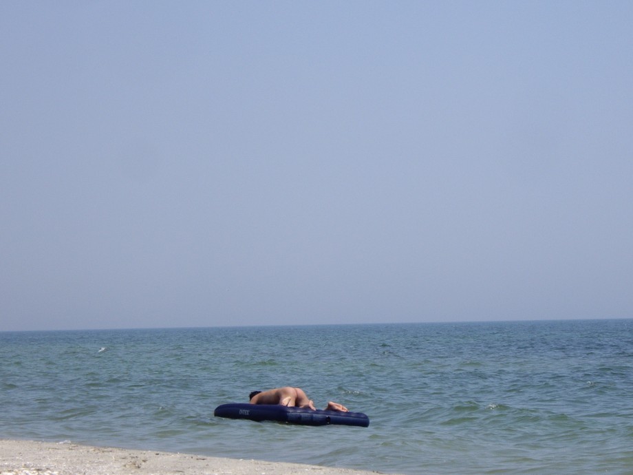 Licking lesbians on beach