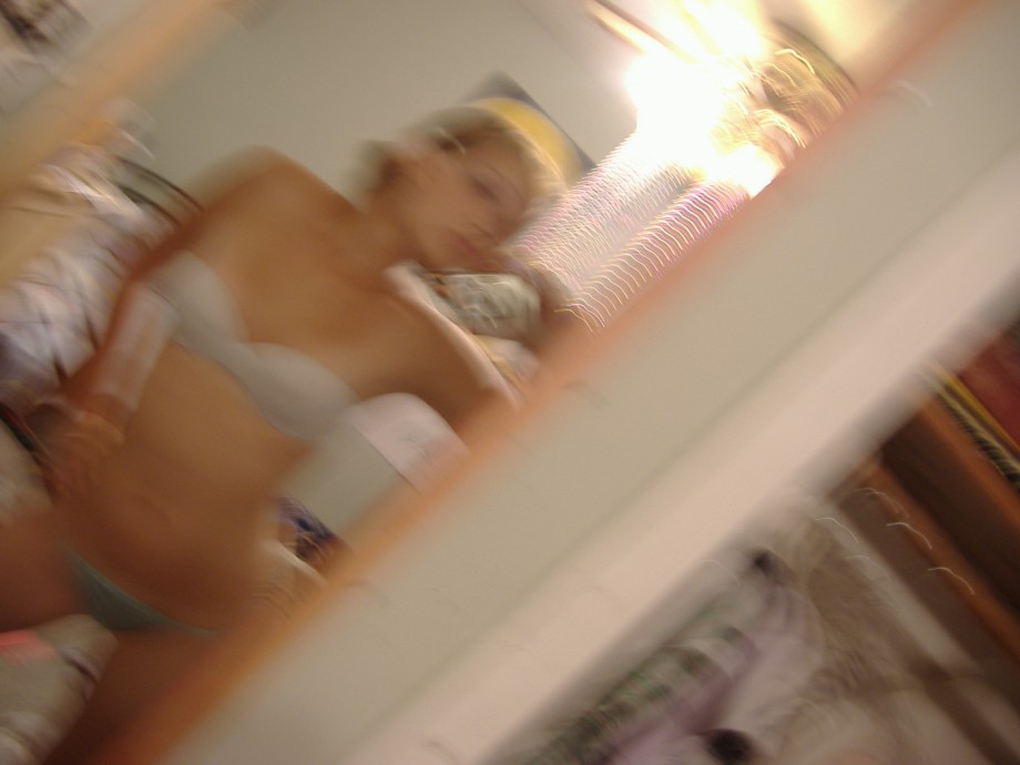 Selfshot blonde in bath mirror