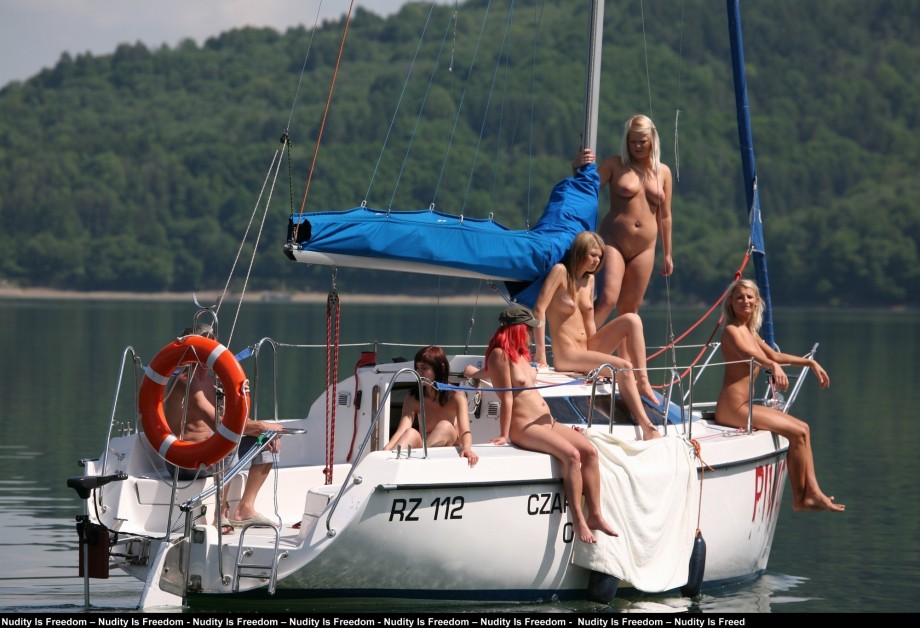 Naked girls sunbathing on the boat